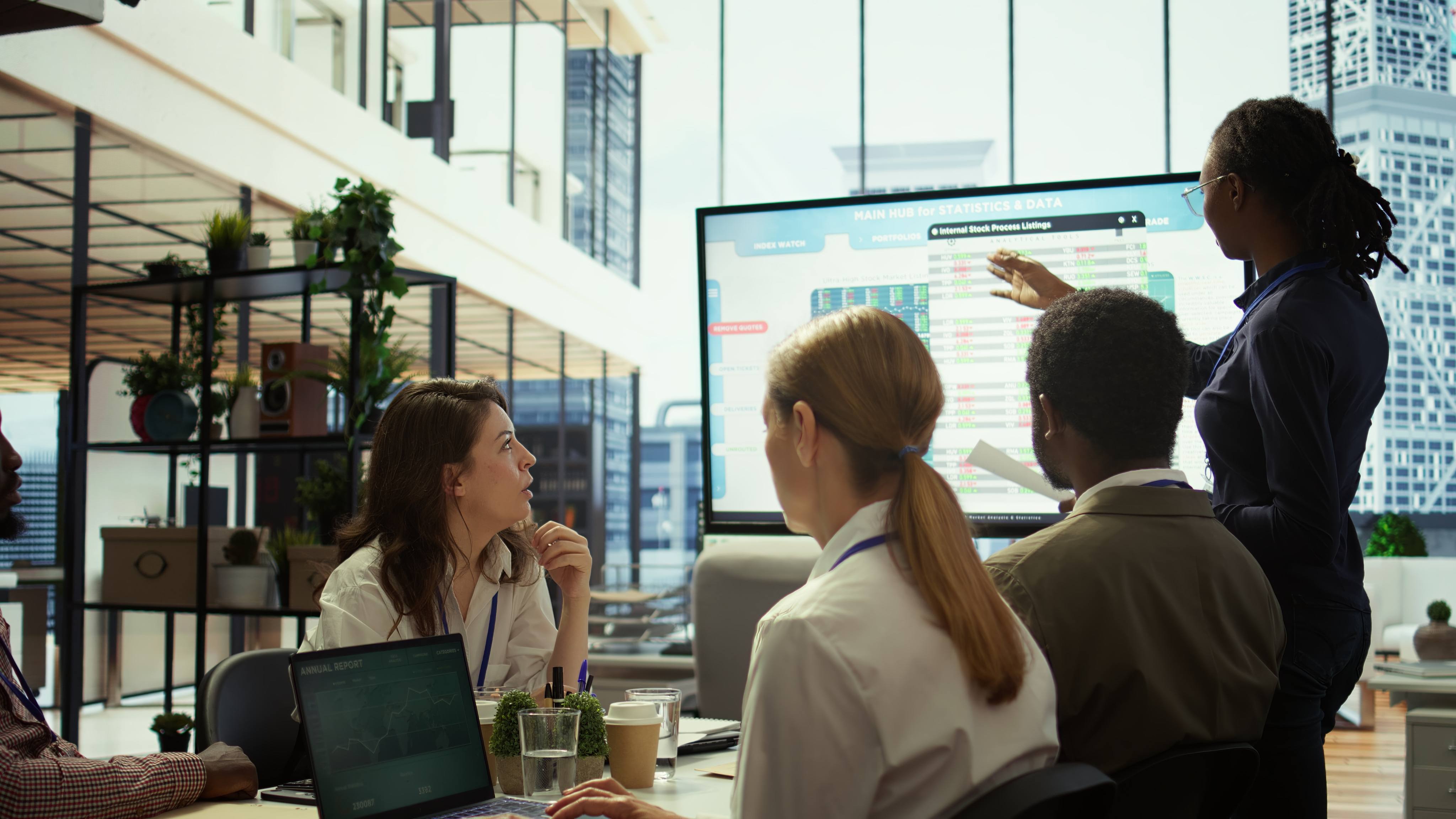 Accounting manager reviewing budget numbers after all monthly costs, working on a financial projection to deduct the future enterprise situation. Presenting infographics during a meeting.